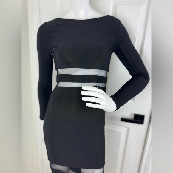 Bebe Elegant Black Sheer Panel Dress. D35 - Picture 4 of 15
